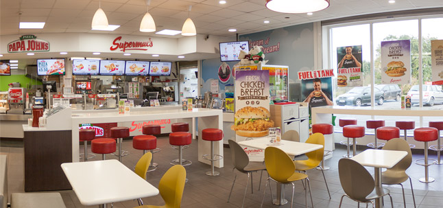 Interior of Supermac's and Papa John's Ballindine on the N17 with seating and counter clearly visible